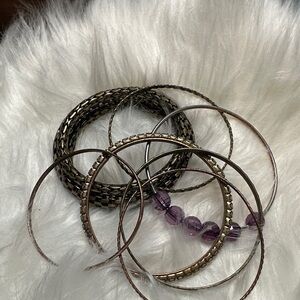 Elegant vintage set of 7 braclets.       A